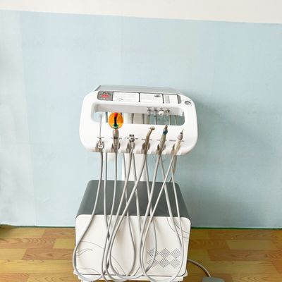 Fabryka Foshan 550W Przenośna Jednostka Stomatologiczna Najlepiej sprzedający Mobilny Zabieg Stomatologiczny wózek elektryczny Mobilny wózek stomatologiczny